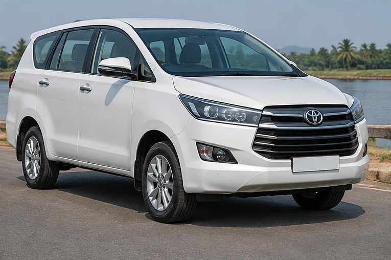 Innova-style MPV parked near the countryside
